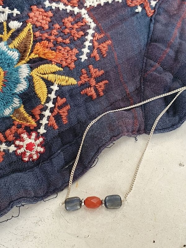 gemstone necklace with embroidered top